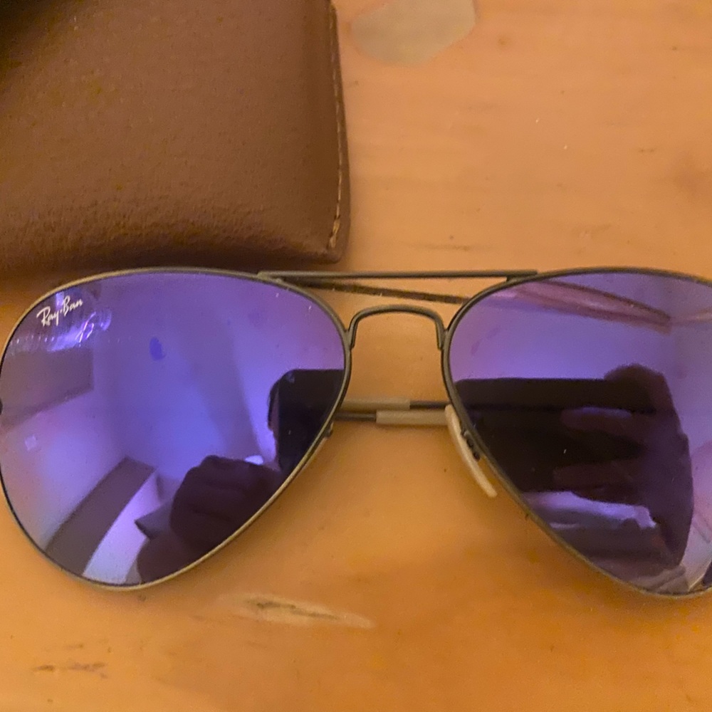 Purple lenses. Ray bans